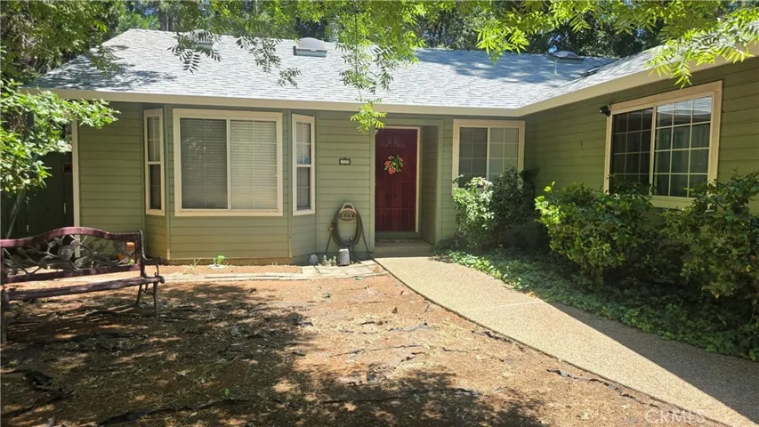 level concrete walkway to front door