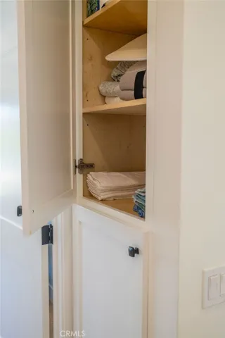 Self-closing door on linen closet upstairs.