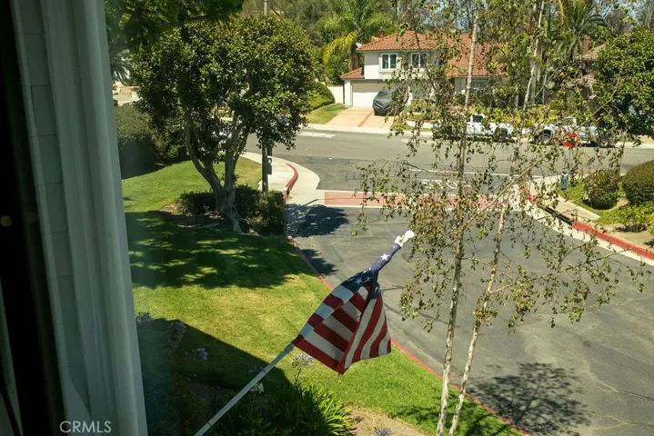 Residential street view from secondary bedroom.