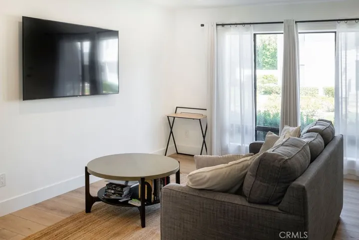 Living room showing included flat panel TV