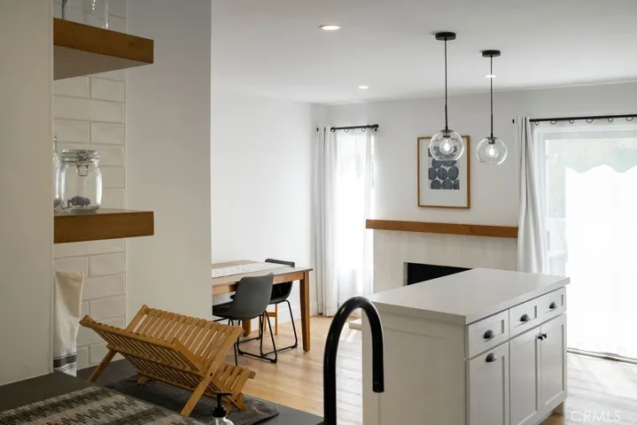 View of family kitchen from bar opening.