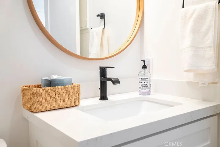 Downstairs 1/2 bath with solid counter