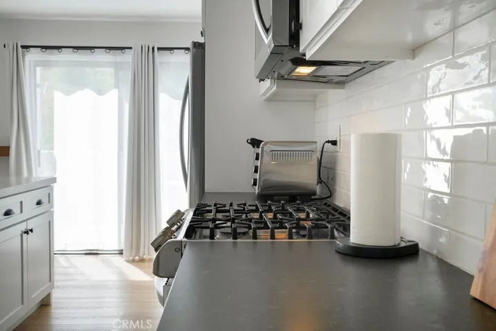 Kitchen view with sheers closed.