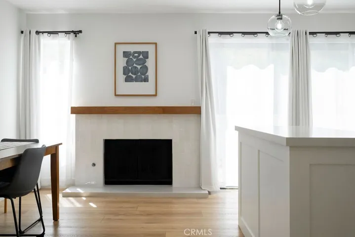 View of family kitchen with sheers closed.