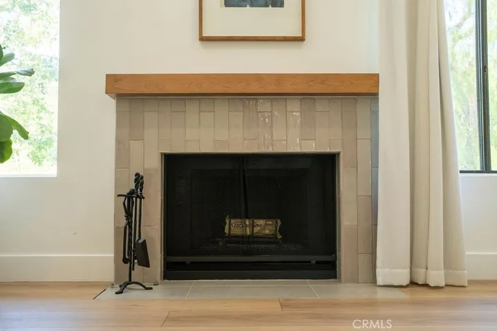 Close-up view of primary bedroom's fireplace.
