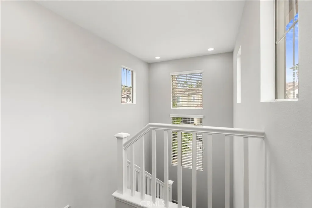 Views of the mountains through two story windows