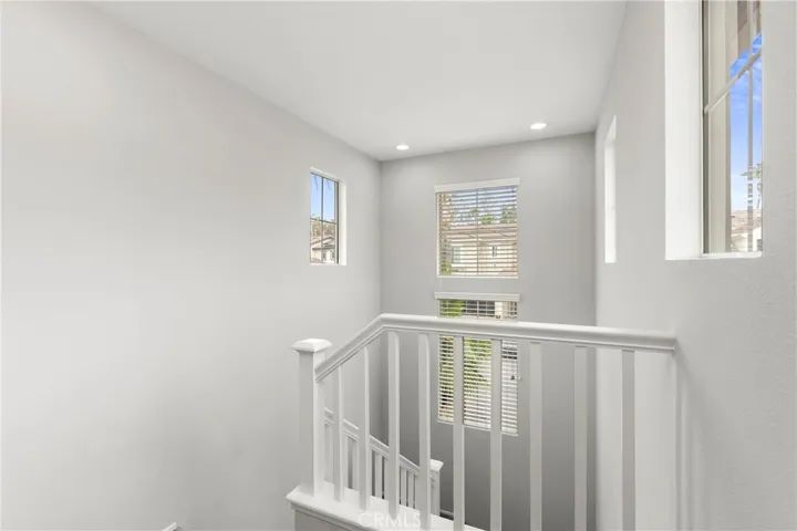 Views of the mountains through two story windows