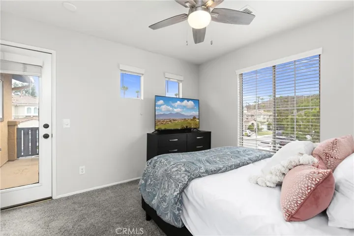 Secondary bedroom opens to private view balcony