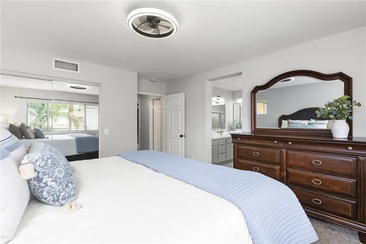 Primary suite features walk in closet