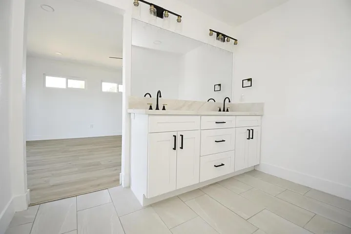 DUAL SINKS IN PRIMARY BEDROOM