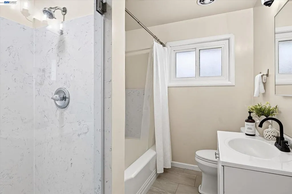 UPGRADED HALL BATH