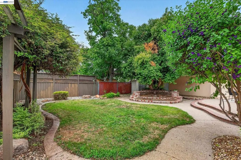 LARGE GRASSY AREA AND SHED