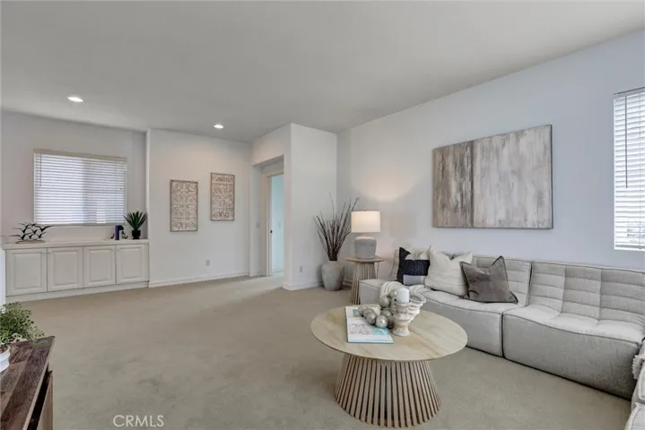 A bright and spacious loft creates the perfect retreat for relaxing, working, or gathering with family and friends.