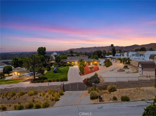 Overview of property with 2 separate houses on 2 acres. DIGITALLY ENHANCED.