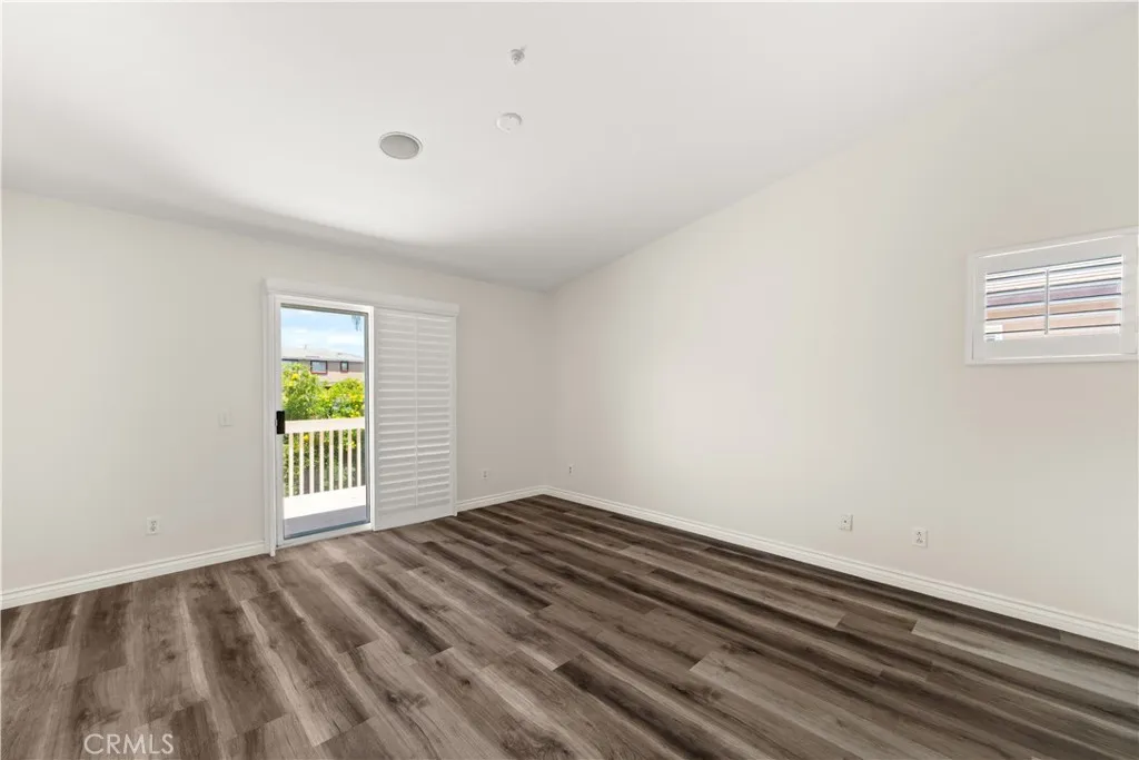 Large primary suite with balcony.