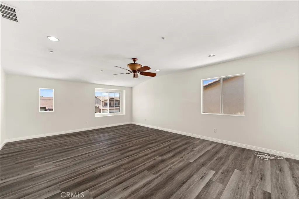 Bonus room with several windows and open space ready for a new pool table!