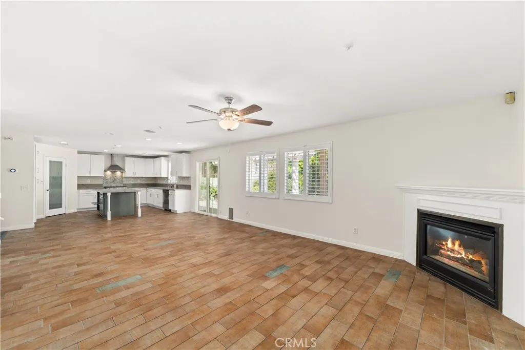 Family room with kitchen beyond.
