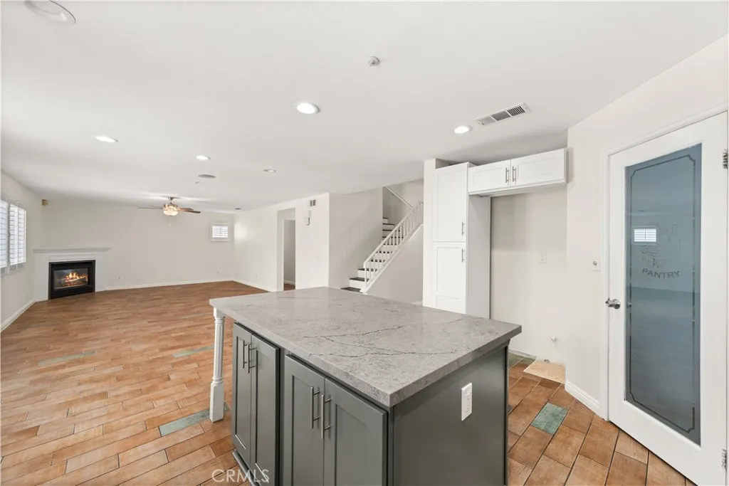 Kitchen with family room beyond.
