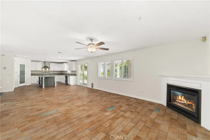 Family room with kitchen beyond.