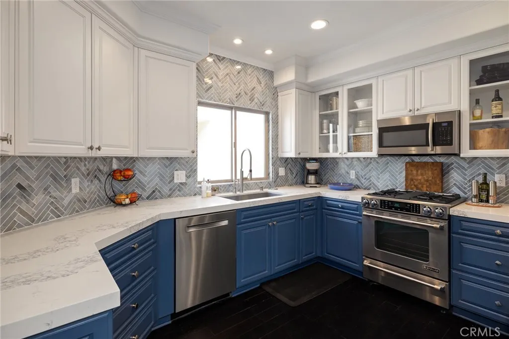 Exquisite kitchen with soft coastal palette.