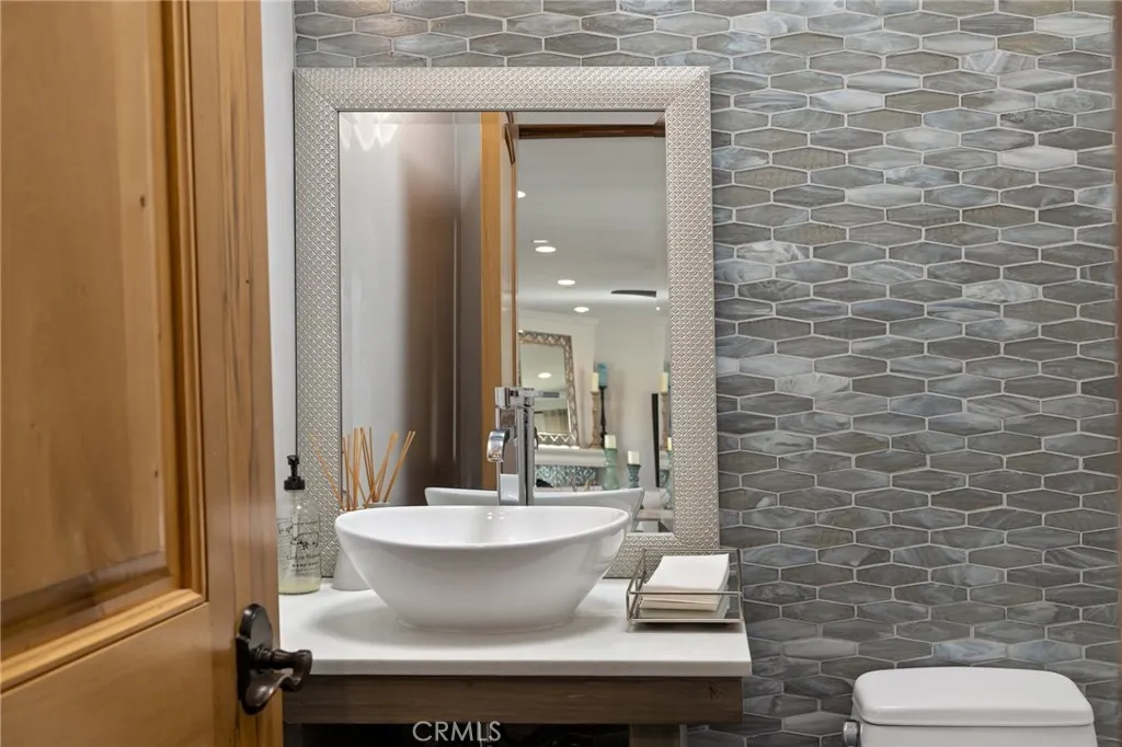 Powder bath adjacent to the great room is sophisticated.