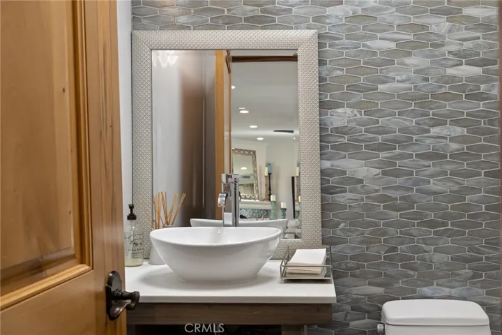 Powder bath adjacent to the great room is sophisticated.