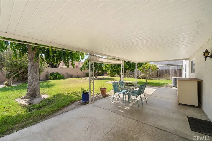 Large Covered Patio Perfect for Outdoor Dining and Entertaining
