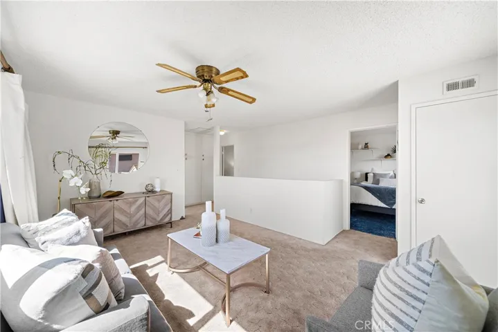 Upstairs Family Room with Slider that Opens to Rooftop Deck Area