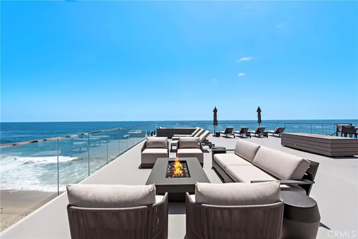 Community deck accessed by close walkway from condo