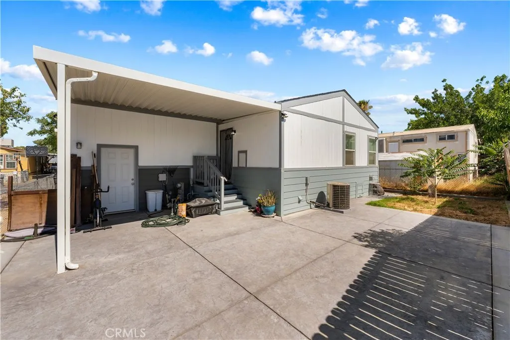 Left door is rear entry to garage.
