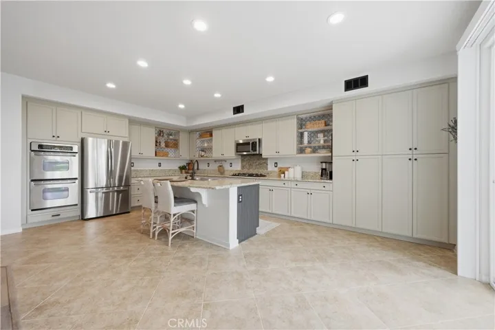 Kitchen. Dual ovens and range.