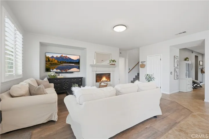 Family Room with cut out nook for flat screen tv.