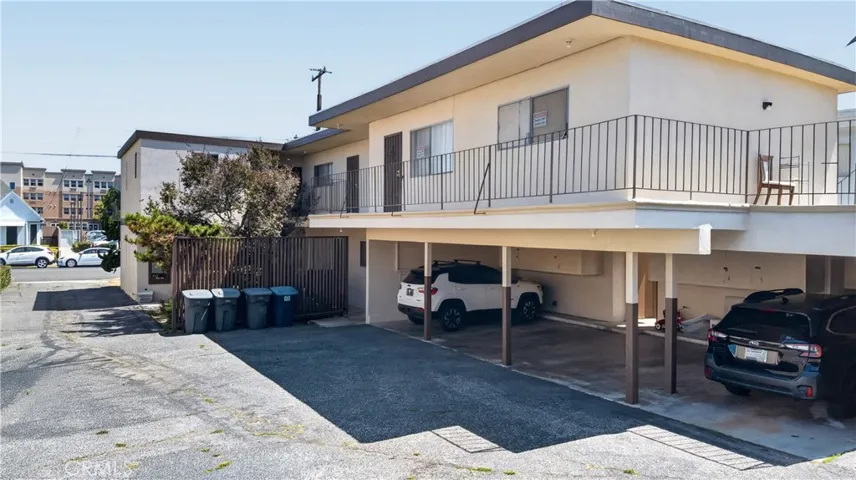 Exterior view of side balcony and carport spaces