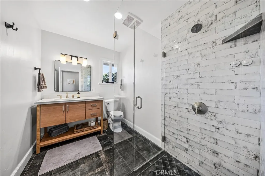 Bathroom on other side of the home that is near the guest bedroom.