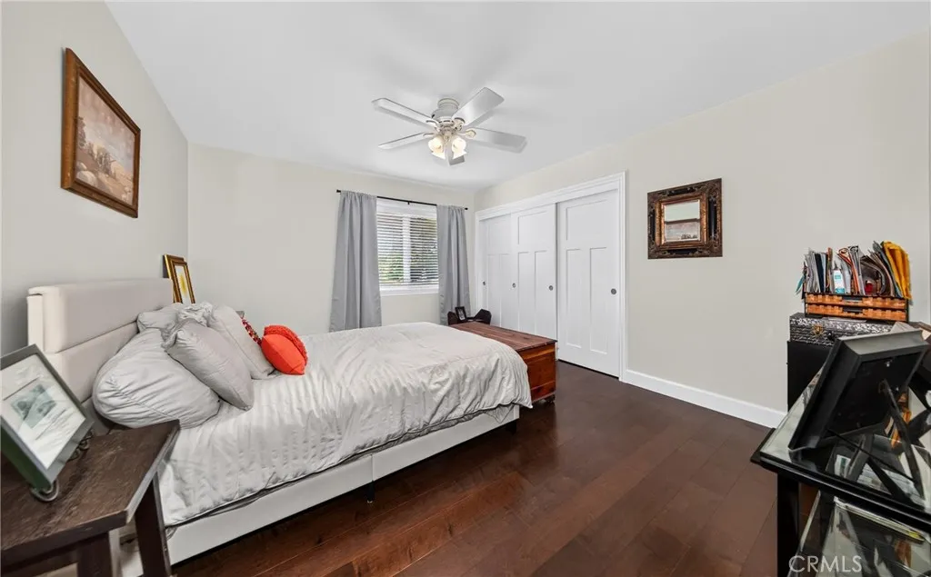 Bedroom with hardwood flooring