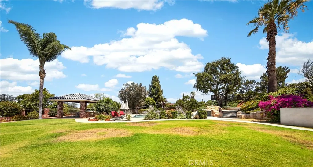Huge backyard with pool/spa/gazebo with built in bbq, sink and fridge