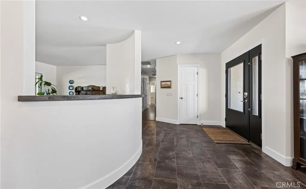 angle from the family room looking at the front door