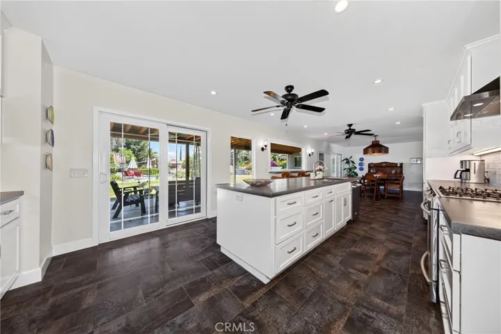 view of kitchen looking into backyard.  There are sliding glass doors on both sides.