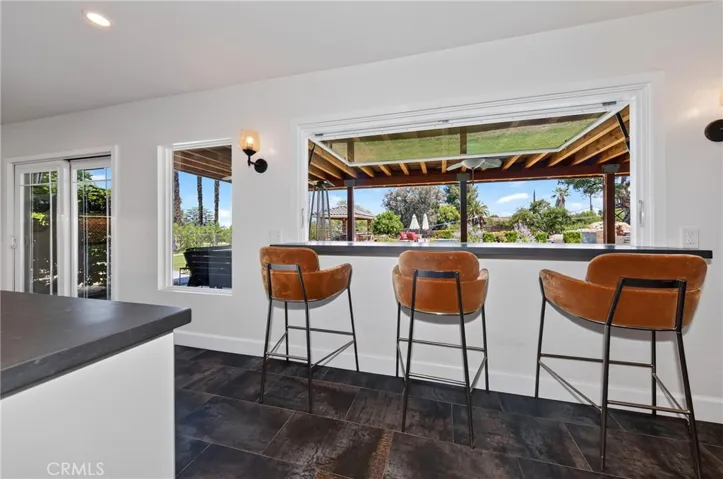 pass thru window that opens up to covered patio