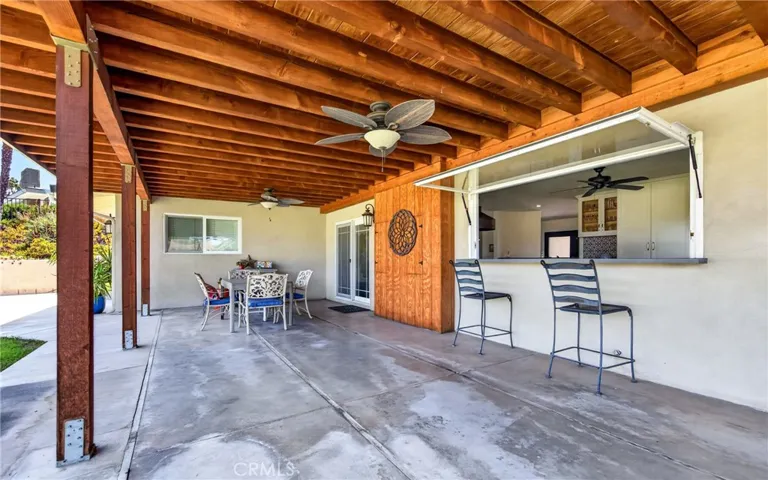Covered patio. Pass thru window in kitchen makes this ideal for entertaining.