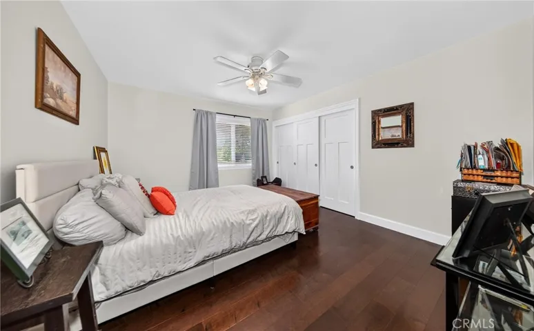Bedroom with hardwood flooring