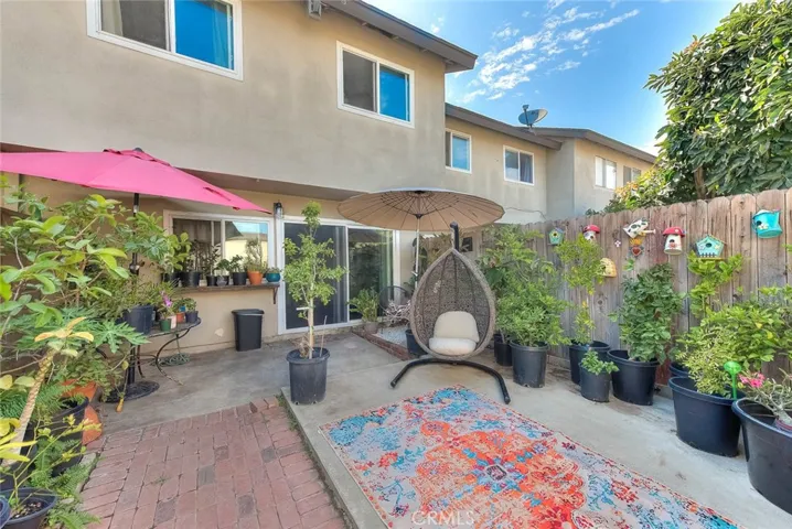 Yard off Kitchen leading to double garage