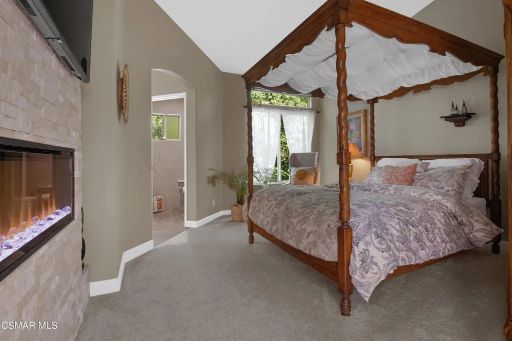 Upstairs Primary Bedroom w/ Fireplace