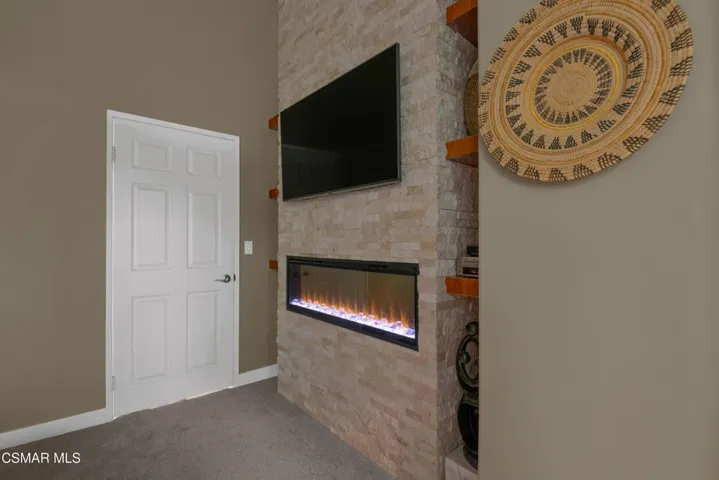 Upstairs Primary Bedroom w/ Fireplace