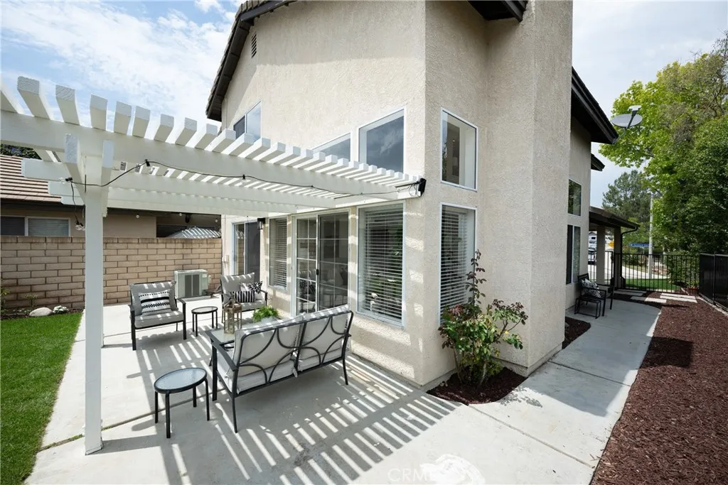 Covered patio and spacious side yard.