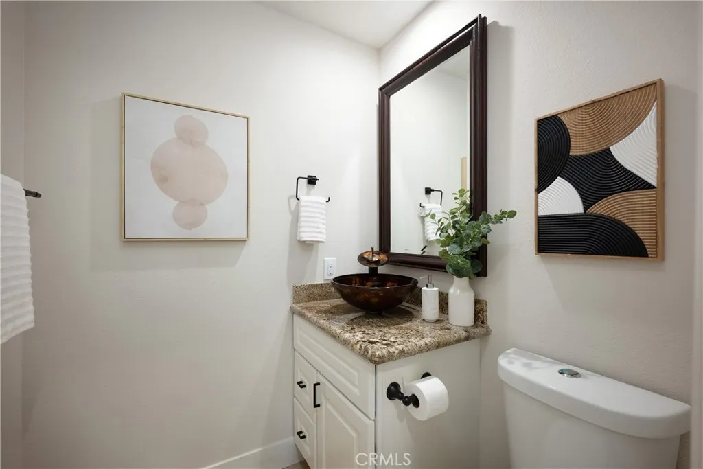Upgraded guest bathroom conveniently located downstairs.