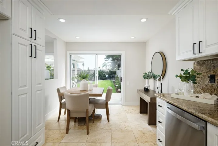 Charming breakfast nook overlooking the backyard.
