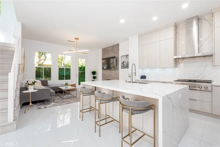 PHOTOS FROM PRIOR LISTING.. (Recently renovated) custom kitchen leading to living room.
