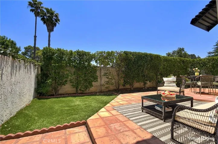 PRIVATE PATIO W/GRASSY AREA