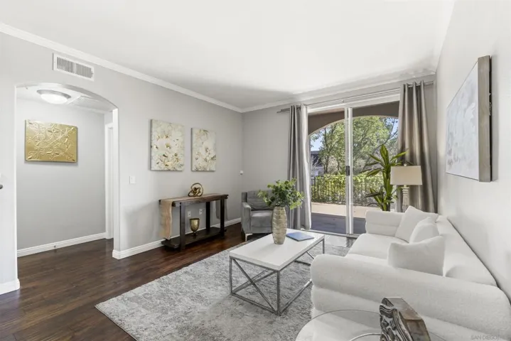 Enjoy the ease of single level, ground-floor living of this 2BR + office end unit residence. Absolutely no stairs or elevators needed to reach your front door.